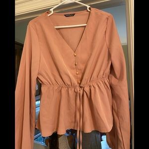 Large, fits a little tight on arms but super cute! You can dress it up!